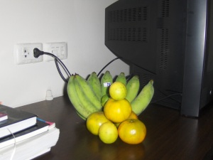 Some lovely 'nanas (green for ripening over the week), some oranges and some limes. Artfully stacked, in honour of Arran.